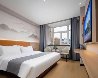 Eurasian Business Hotel Nanyang - Nanyang - Chambre