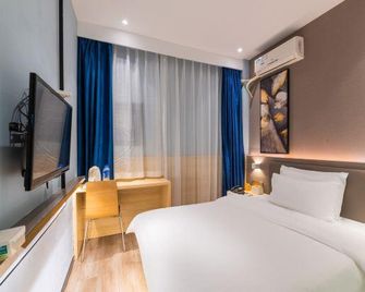 7 Days Premium Hotel (Fuzhou Mawei Shipbuilding culture) - Фужоу - Спальня