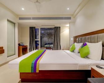 Treebo Ranjeet Shivaji Nagar - Pune - Bedroom