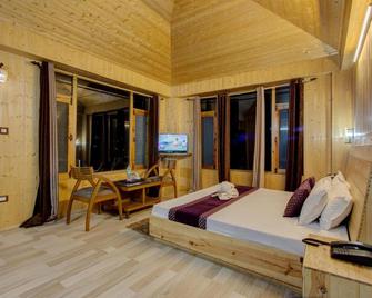 Hotel Japika Inn - Manali - Bedroom