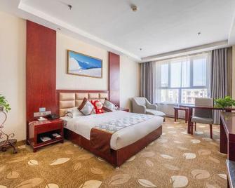 Jinrun Hotel - Jiuquan - Bedroom