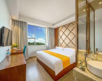 Xinyuan Business Hotel - Xiangyang - Bedroom