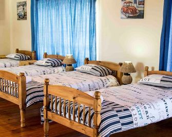 Victoria Heights B&B - ג'ורג' - חדר שינה