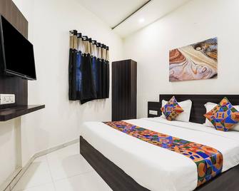 Fabhotel Sk - Rajkot - Schlafzimmer