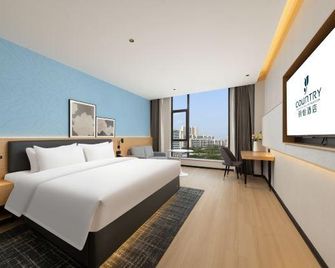 Country Inn & Suites by Radisson Hotel (Yuncheng Xinghe Square) - Yuncheng - Bedroom