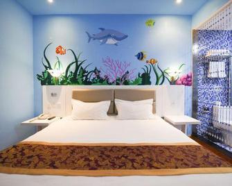 Dushi 118 Qingdao Golden Beach Branch - Qingdao - Habitación