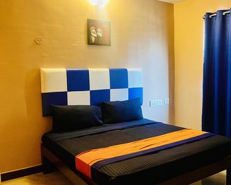Hotel Star City - Tiruchirappalli - Slaapkamer