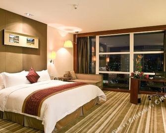 Lafonte International Hotel - שנג'ן - חדר שינה