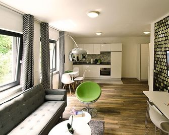 Eco Smart Apartments Nürnberg Süd - Nuremberg - Oturma odası