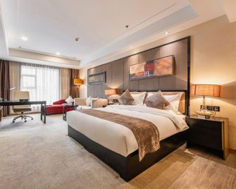 Quanshun Hotel - Ürümqi - Bedroom