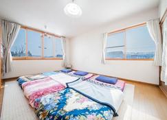 Guesthouse Chiyogaoka - Asahikawa - Bedroom