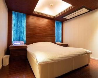 Hotel Tiki - Tokushima - Schlafzimmer