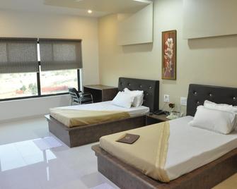 Hotel Shriji Resorts - Chhindwāra - Bedroom