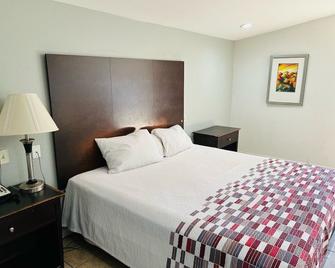 Safari Inn Motel - Corpus Christi - Schlafzimmer