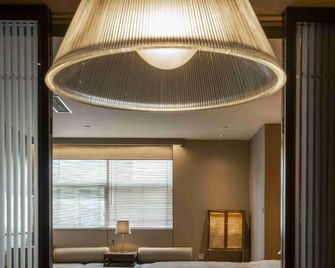 The Hidden Place Hotel - Chengdu - Schlafzimmer