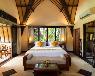 Hotel Vila Lumbung - קוטה - חדר שינה