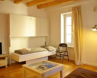 Trentino Apartments - Il Gufo Vacanze - Borgo Valsugana - Camera da letto