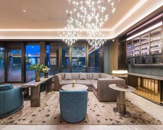 Shanghai Baoshan Baoyang Road Crystal Orange Hotel - شنغهاي - ردهة