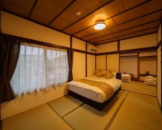 Yufuin Ekimae Yado Kachofugetsu - Vacation Stay 88189v - Yufu - Habitación
