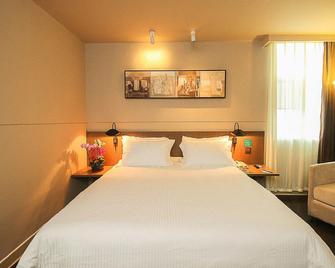 Jinjiang Inn Select Haikou Qilou Old Street Binhai Avenue - Haikou - Bedroom