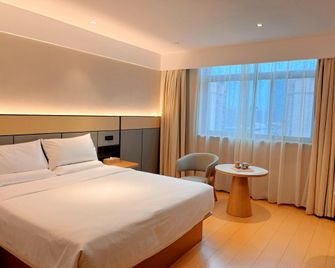 Ji Hotel Shanghai Jiayi Road Metro Station - Shanghai - Bedroom