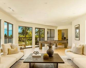 Experience luxury living in this private city-to-ocean view estate nestled in Mandeville Canyon - Los Angeles