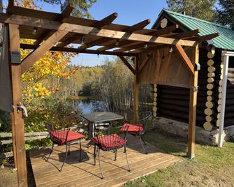 Domaine le Bostonnais - Le Village en Bois Rond - La Tuque - Binnenhof