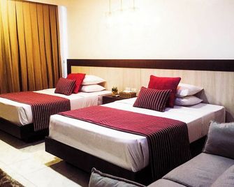 Royale House Hotel Davao powered by Cocotel - Tagum - Bedroom