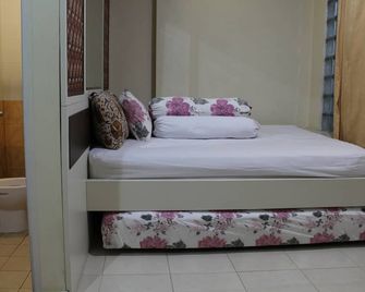 Kantos Guest House - Jakarta - Bedroom