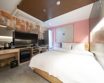 Goodstay Grand Motel Chuncheon - Chuncheon - Camera da letto