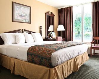 Carmel Inn and Suites Thibodaux - Thibodaux - Schlafzimmer