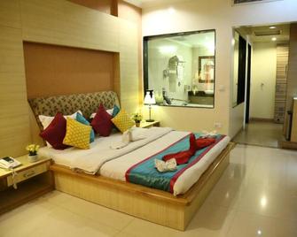 هوتل راجشري - تشانديغاره - غرفة نوم