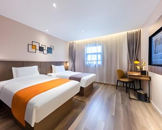 Home Inn Plus Guangzhou Shangxiajiu Pedestrian Street Yongqingfang - غوانغزهو - غرفة نوم