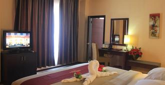 Hotel Gran Central - Manado - Bedroom
