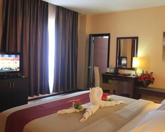 Hotel Gran Central - Manado - Bedroom