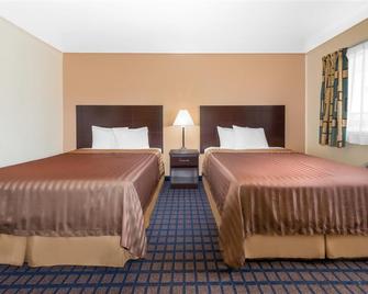 Travelodge by Wyndham Dodge City - Dodge City - Ložnice