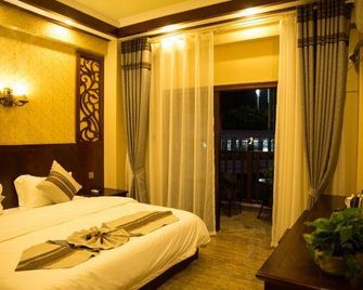 Muchun Inn (Xishuangbanna Poshui Square) - Xishuangbanna - Makuuhuone