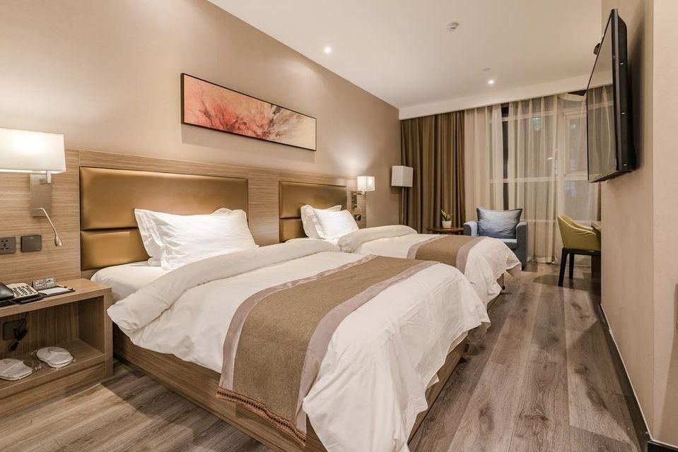 Jinjiang Metropolo Hotel Qingdao Xinduxin Capitaland Plaza - تشينغداو - غرفة نوم