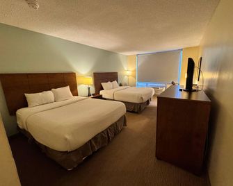 Quality Inn & Suites - Sydney - Schlafzimmer