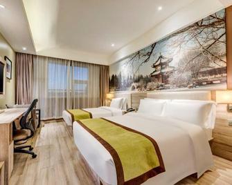 Wuduo Hotel (Baoding Zhili Governor's Office Railway Station) - Baoding - Slaapkamer