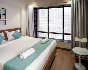 Sunbright Hotel - Thane - Quarto