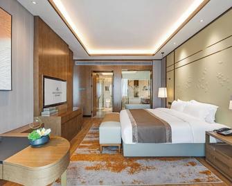 Changde High-Tech Zone Lavi Huating Hotel - Changde - Bedroom