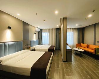 Vatica Hotel (Beijing Tongzhou Global Resort Branch) - Pekín - Habitación