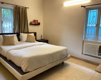 The Aster Homestay - Bedrooms & Apartments - Calcuta - Habitación