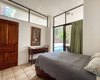 Casa Lapa Penthouse Oceanside Villa - Playa Hermosa - Habitación