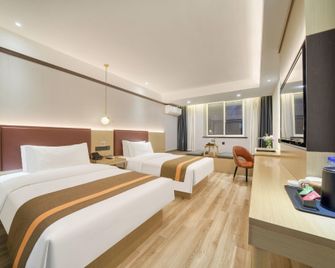 Gya Hotel Jiaxing Nanhu Fanggong Road - Jiaxing - Slaapkamer