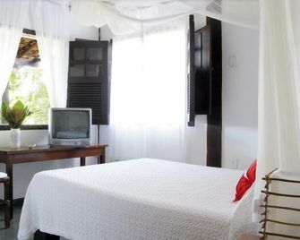 Pousada Calypso - טרנקוסו - חדר שינה