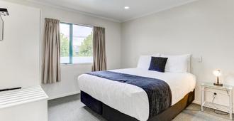 Asure Cooks Gardens Motor Lodge - Whanganui - Schlafzimmer