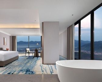 Yunfu Yunan Fengyue Holiday hotel - Yunfu - Bedroom
