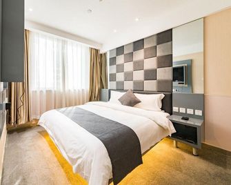 Elong Ruiyun Hotel (Yancheng International Exhibition Center) - Yancheng - Schlafzimmer